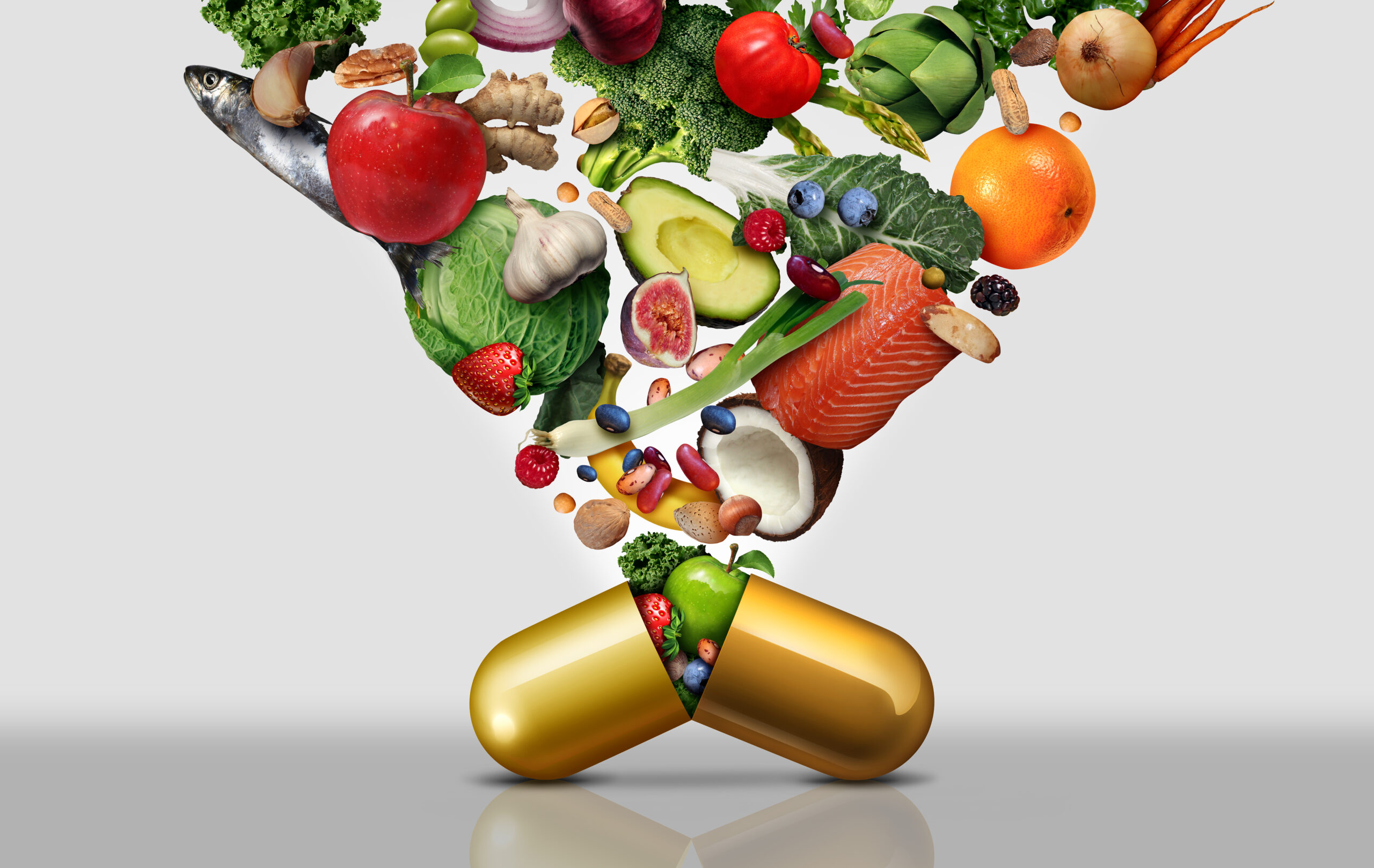 Gold pill capsule bursting open with a variety of fruits and vegetables shooting out of it and up out of the photo.